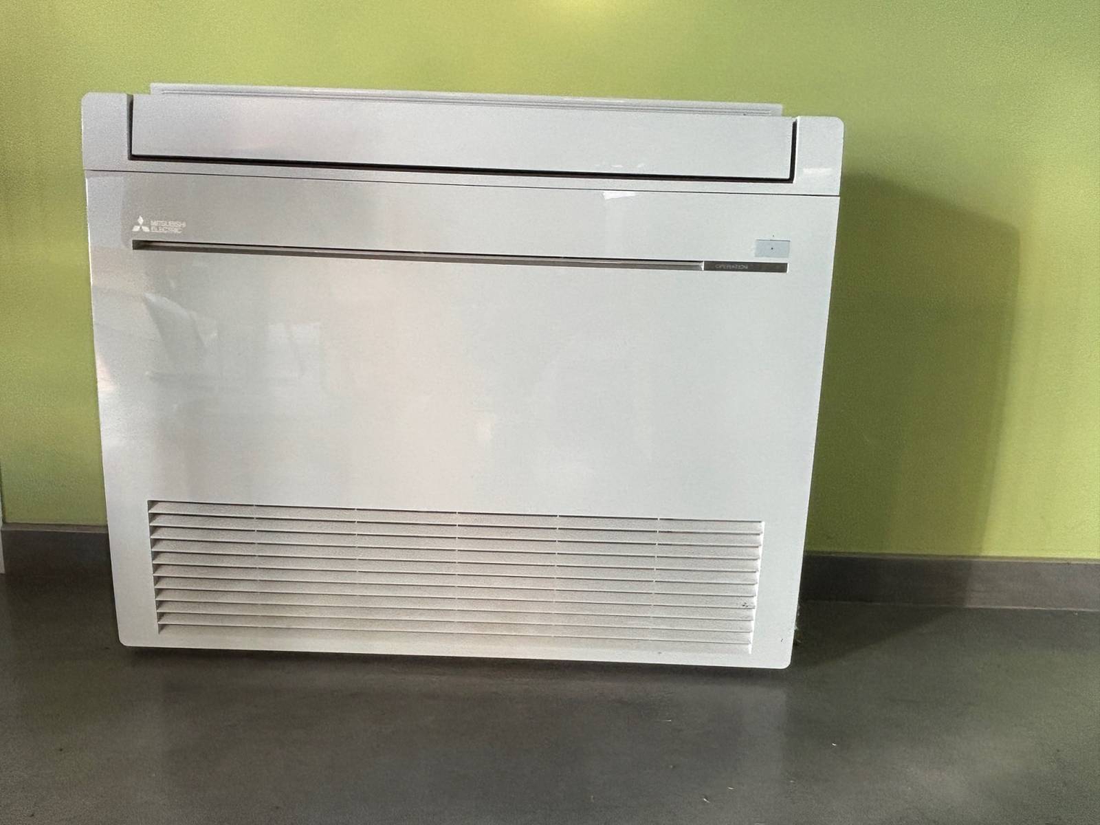 Pose d'une climatisation console dans commerce à La Garde